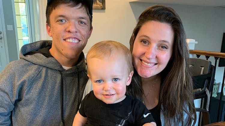 tori roloff and husband zach smiling at camera with son jackson