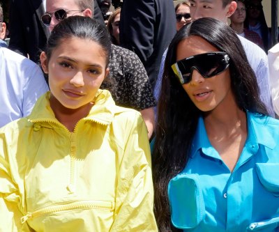 Kylie Jenner and Kim Kardashian at the Louis Vuitton Show