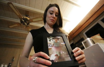 Casey Anthony Holds Picture of Daughter Cayley
