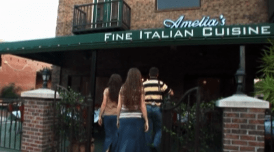 josh, jana, jill, jessa, and jinger duggar entering an italian restaurant