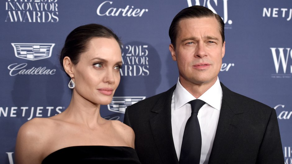 Angelina Jolie and Brad Pitt wearing all black at an event together