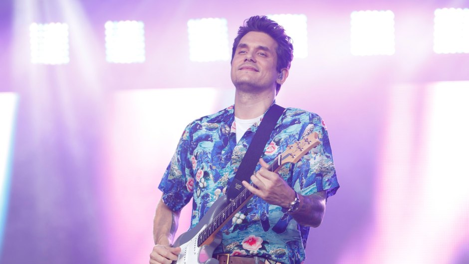 John Mayer playing guitar, wearing a print shirt
