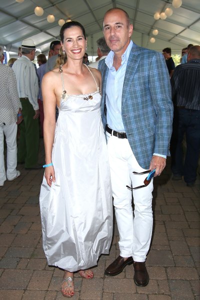 Matt Lauer and Annette Roque at an event together, she is wearing a silver dress