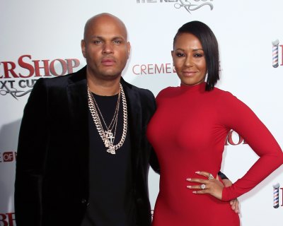 Mel B wearing red with her ex husband Stephen Belafonte