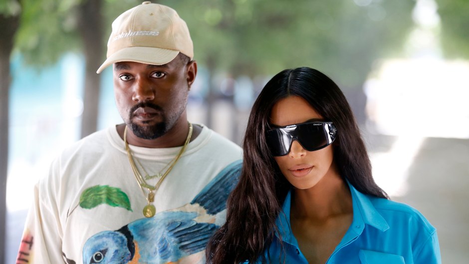 Kim Kardashian Wearing Sunglasses With Kanye West In Hat
