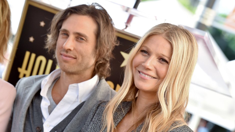 Gwyneth Paltrow and Brad Falchuk together at an event, Brad wearing a sweater vest