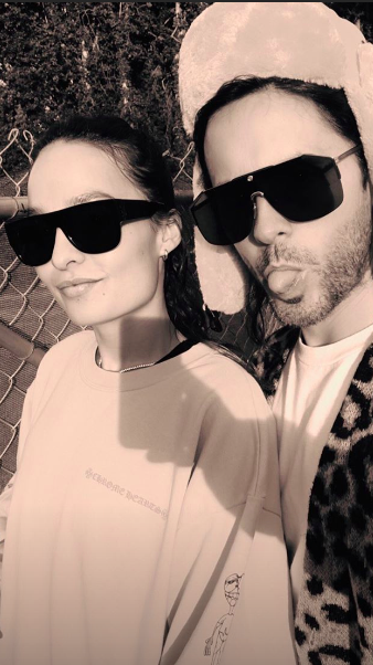 Chloe Bartoli with Jared Leto wearing sunglasses