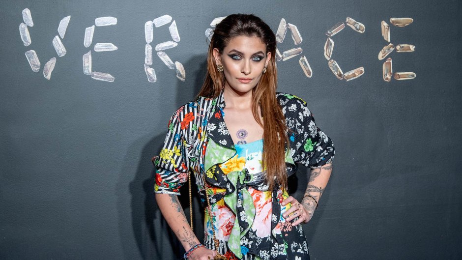 Paris Jackson wearing a lot of patterns at a fashion show