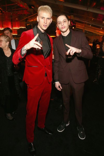 Pete Davidson in a suit with Machine Gun Kelly