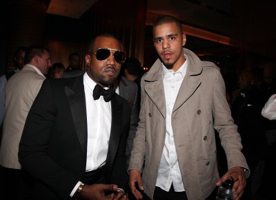 J. Cole and Kanye West wearing coats