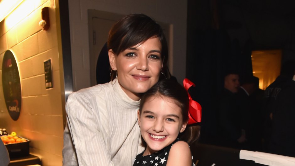 Katie Holmes with Suri Cruise at an event