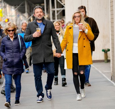 Ben Affleck and Lindsay Shookus holding hands and drinking coffee in NYC
