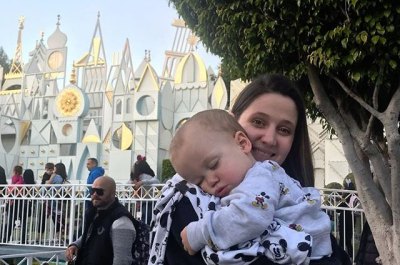Tori Roloff Holds Sleeping Jackson At Disneyland