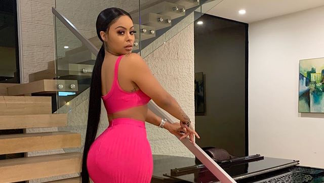 Alexis Skyy Poses In Pink Two Piece Outfit On Staircase