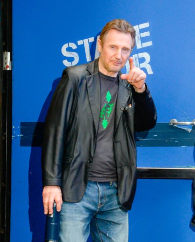 Liam Neeson wearing a black jacket in NYC