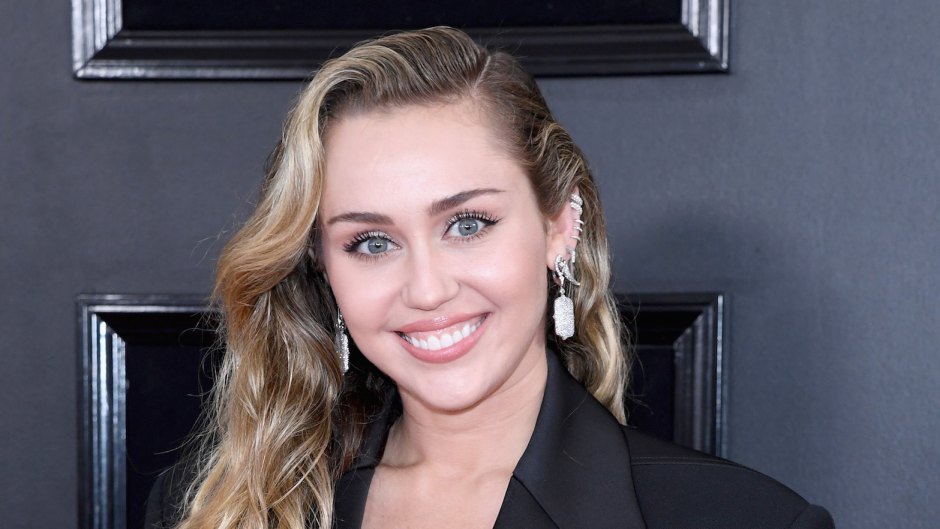 Miley Cyrus wears a black pantsuit at the Grammys