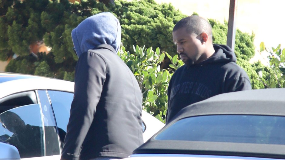 Kanye West looks glum amid family drama