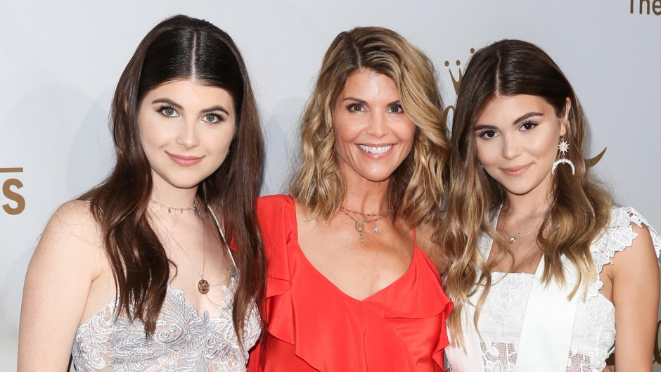 lori loughlin wearing a red dress with her 2 daughters