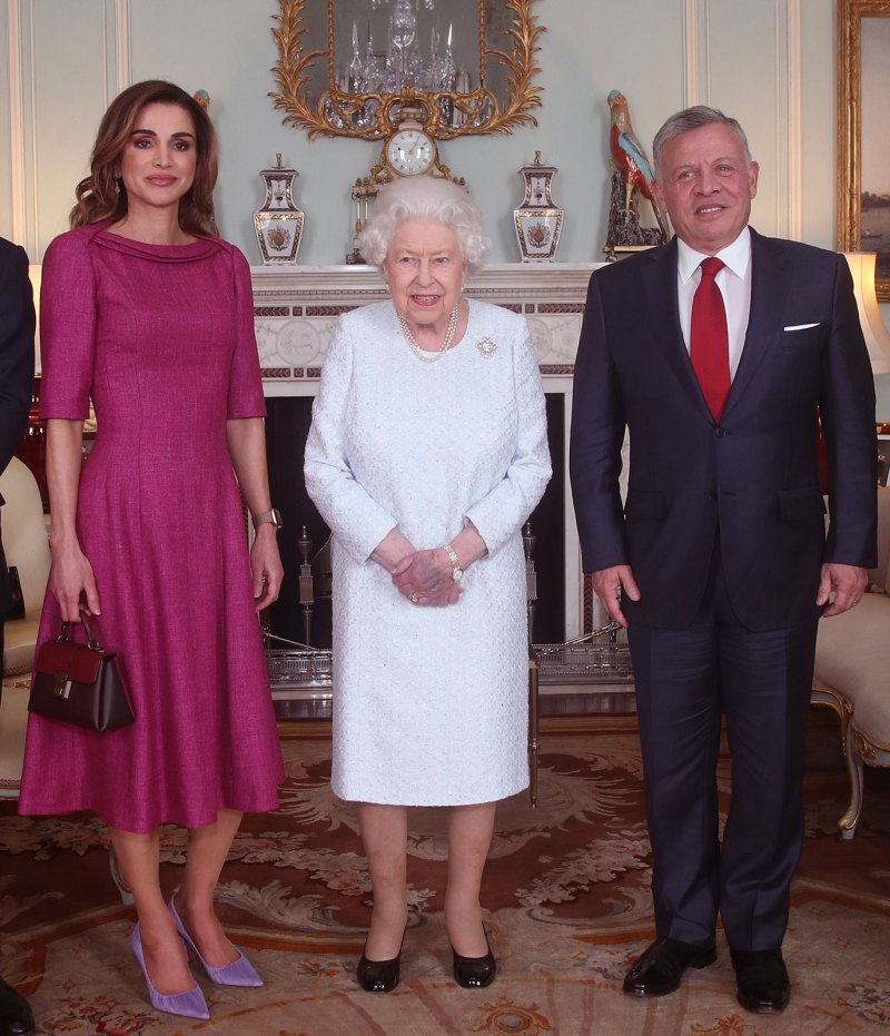 Ouch! Queen Elizabeth's Hand Is Completely Purple in New Photos