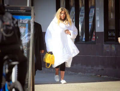 Wendy Williams goes grocery shopping wearing a giant down coat in New York