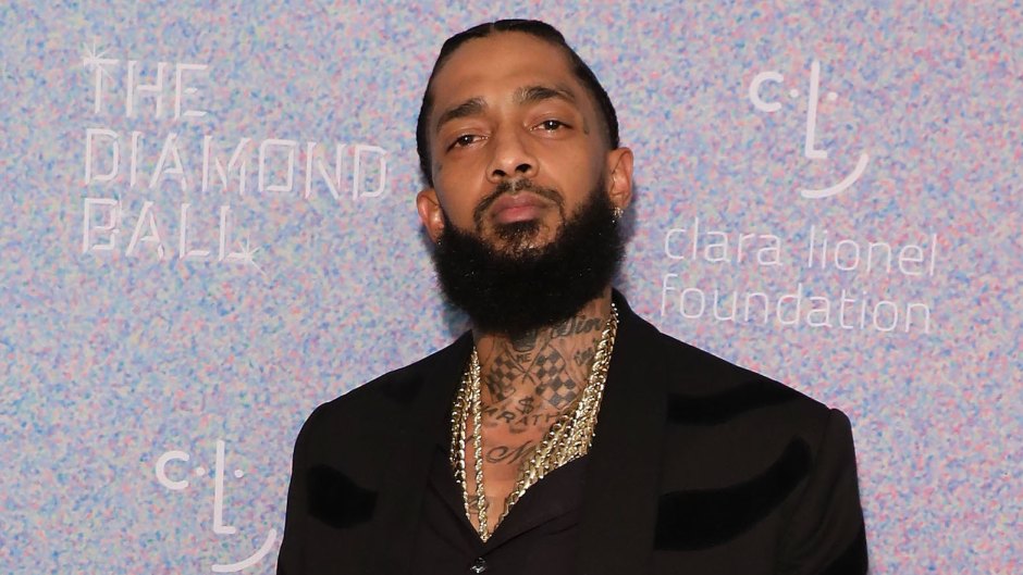 nipsey hussle wearing a black outfit