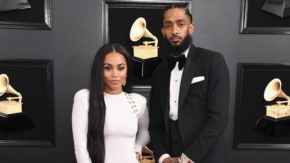 nipsey hussle with lauren london at the grammys