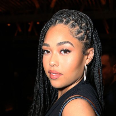 Jordyn Woods Wearing a Purse and Black Outfit