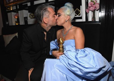 Lady Gaga in a Blue Dress with Christian Carino Kissing