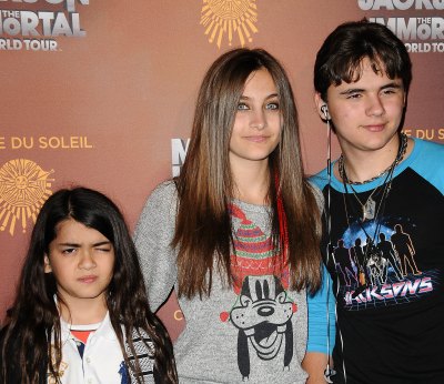 Paris Jackson Wearing a Gray Shirt with Her Brothers Blanket and Prince