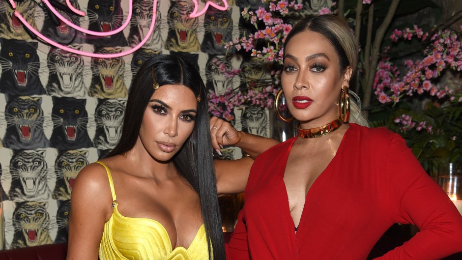 Kim Kardashian Wearing a Yellow Dress While La La Anthony Wore a Red Dress