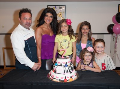 The Giudice Family With a Birthday Cake