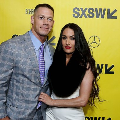 Nikki Bella Wearing a White Background With Ex John Cena in a Suit