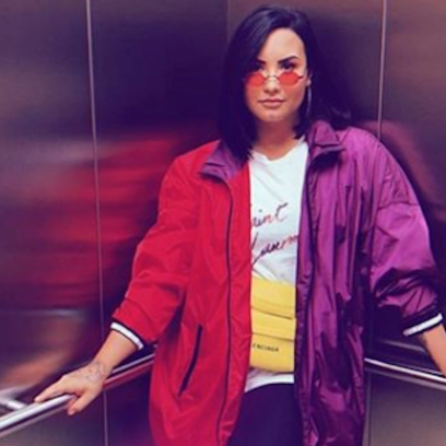 Demi Lovato Wearing a Rainbow Jacket