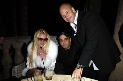 Britney Spears Wearing a White Coat a Club With Sam Lufti
