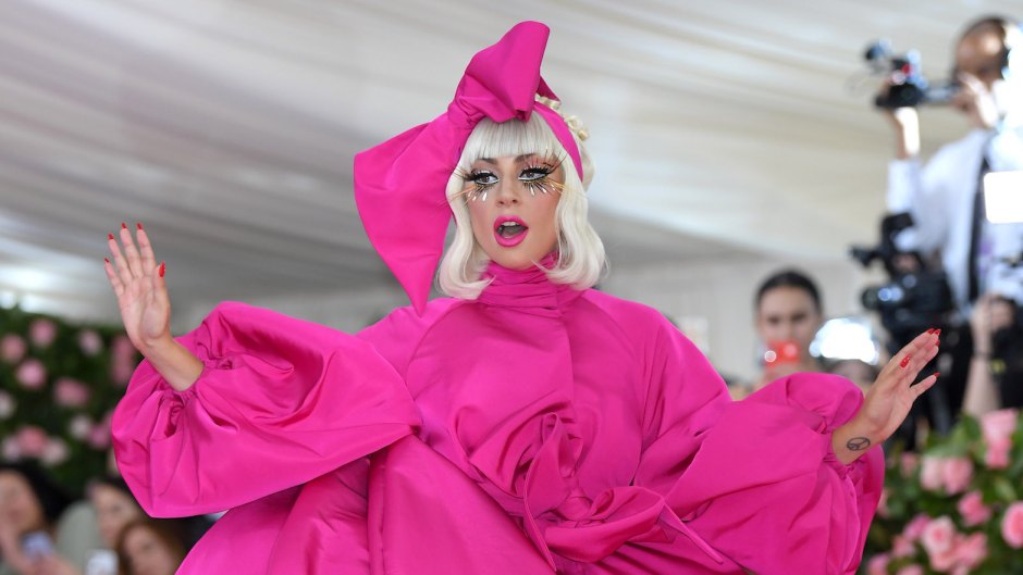 Lady Gaga Wearing a Huge Pink Dress with a Bow on Her Head to the Met Gala
