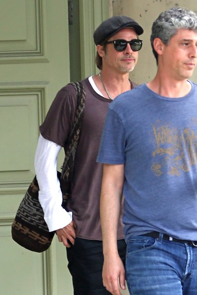 Brad Pitt Wearing Sunglasses and a Hat Walking in Malibu