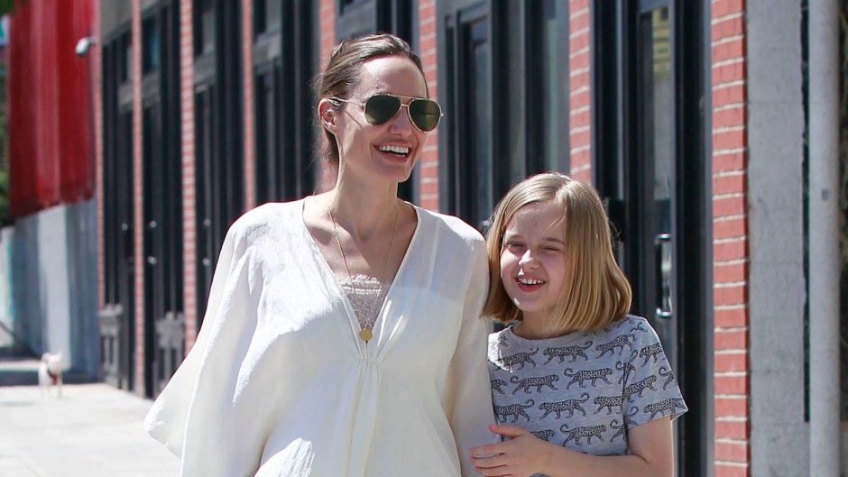 Angelina Jolie Wearing Sunglasses and a White Top With Vivienne