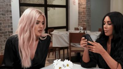 Khloe Kardashian Talking to Kim Kardashian During a Meal