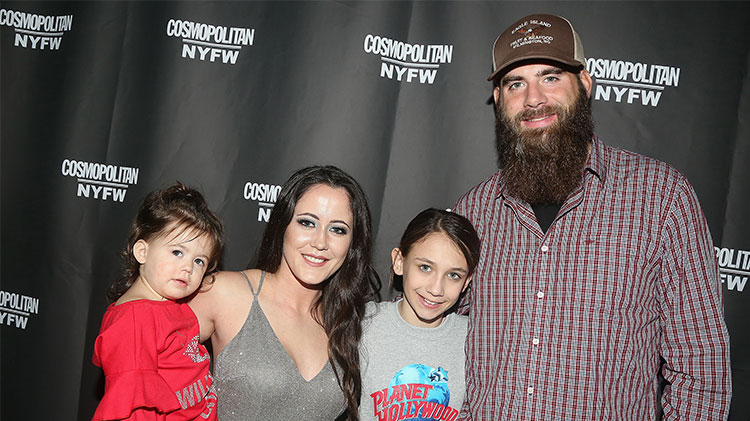 jenelle evans poses with husband david eason with daughters maryssa and enlsey at a red carpet event jenelle evans david eason fathers day childless