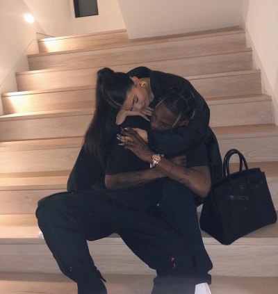 Kylie Jenner and Travis Scott Hugging on the Stairs