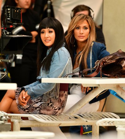 Constance Wu Wearing a Jean Outfit with Jennifer Lopez Sitting Next to Her