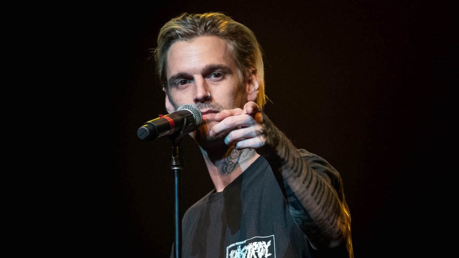 Aaron Carter Singing at a Concert and Pointing at the Camera