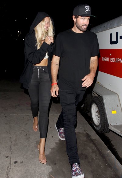 PAID FOR - ONE TIME USE brody jenner wears black pants, black shirt, black hat and sneakers while josie canseco wears black jeans, white crop top, black hoodie and heels on date night