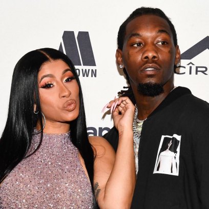 Cardi B Touching Offset's Face on a red Carpet