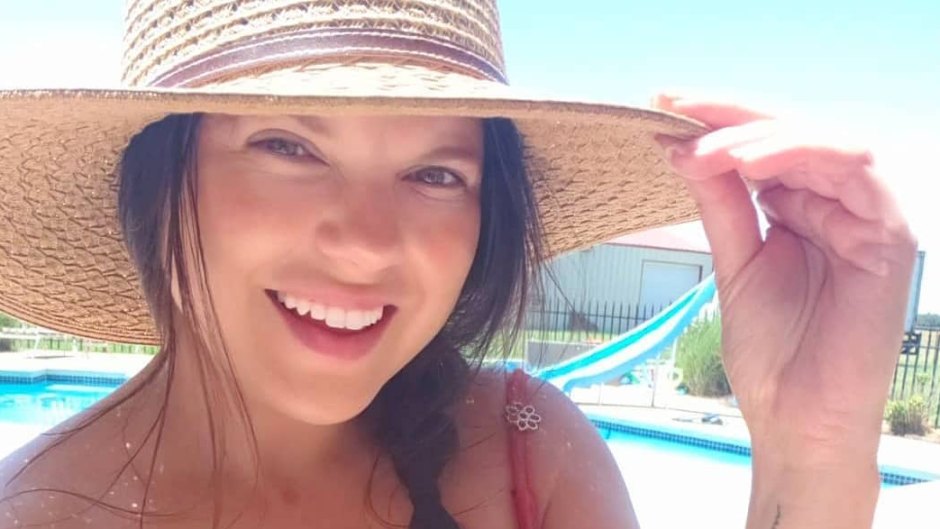 Cousin Amy Duggar Smiles in Straw Beach Hat