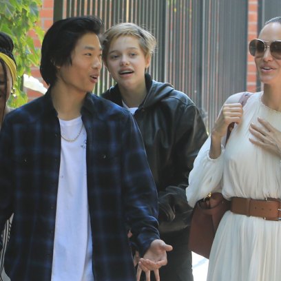 Angelina Jolie Wearing a White Dress With Her 3 Kids