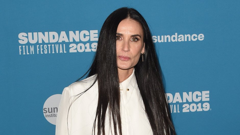 Demi Moore Poses in White on Red Carpet