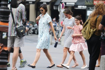 Katie Holmes Wearing a Blue Dress With Suri Cruise
