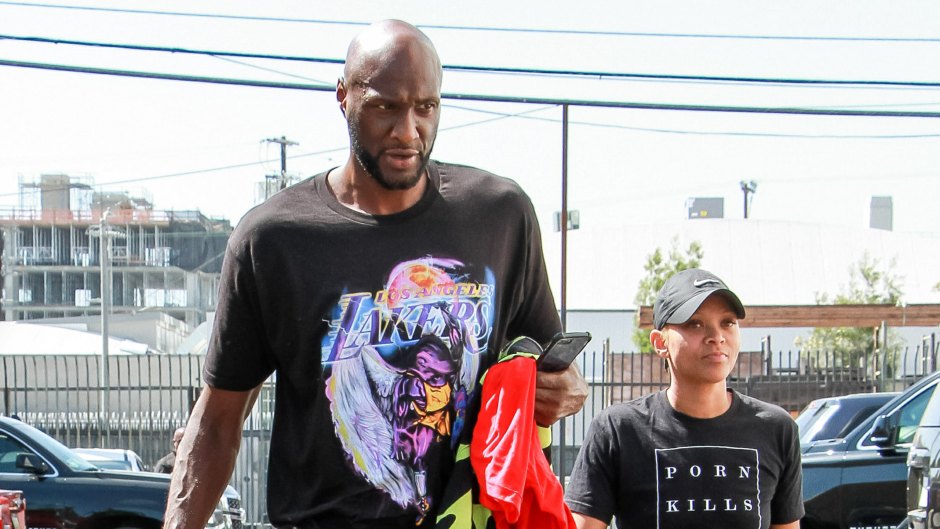 Lamar Odom Wearing a Black T-Shirt With His Girlfriend at the DWTS Studio