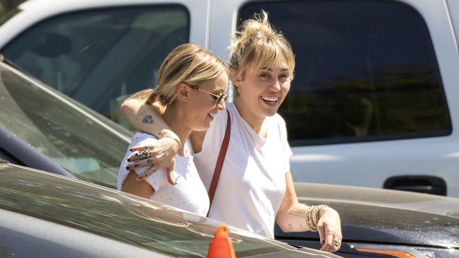 Miley-Cyrus-and-Kaitlynn-Carter-Arms-Around-Each-Other-02